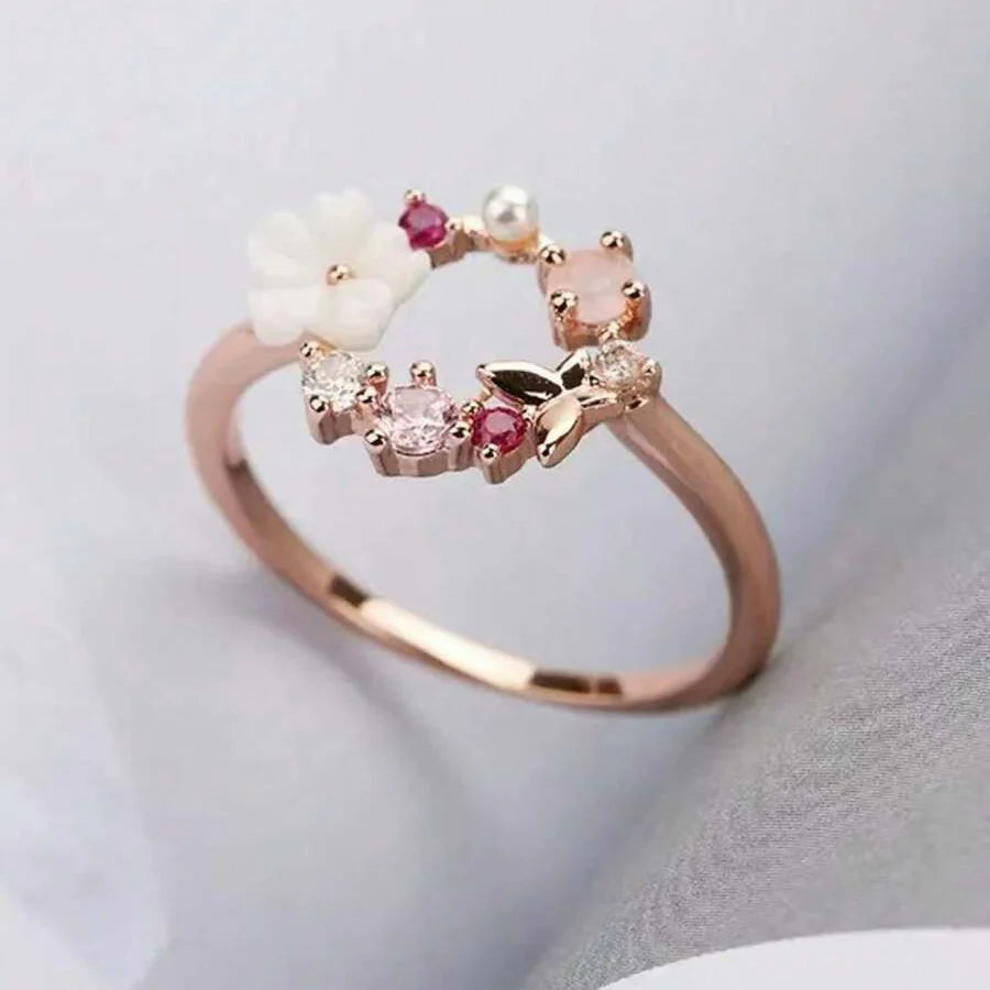 Roségouden ring met bloemkrans, parel en gekleurde zirkonia