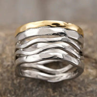 Zilveren brede golvende ring met goudkleurige rand