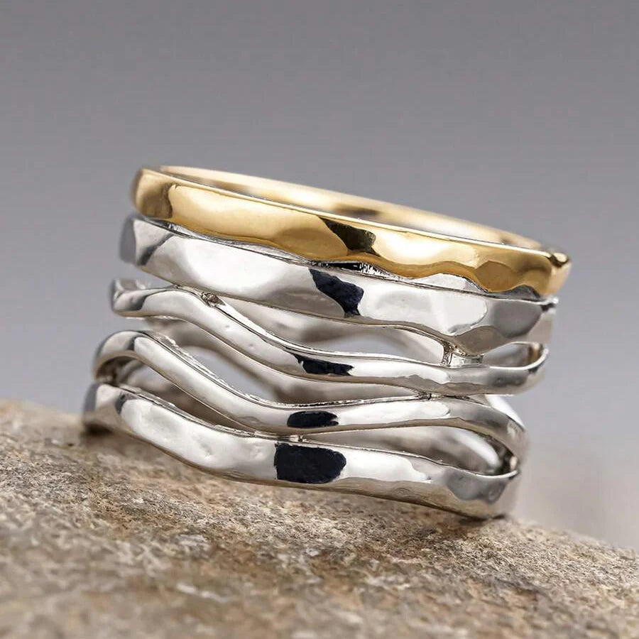 Zilveren brede golvende ring met goudkleurige rand