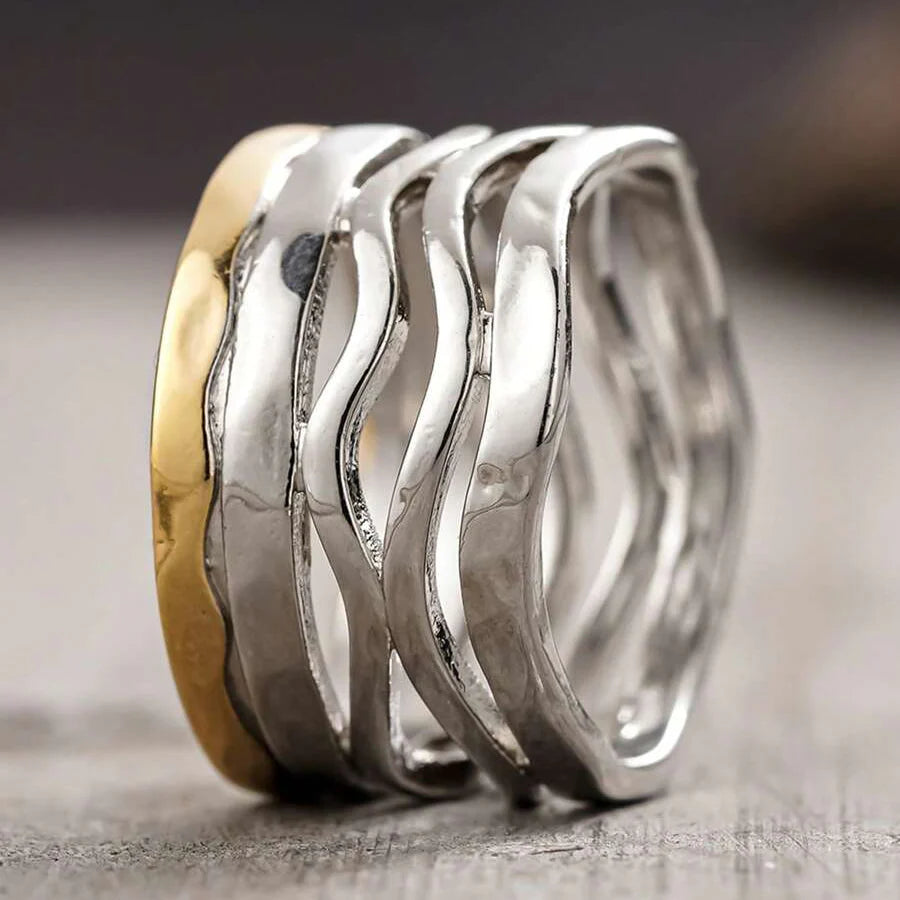 Zilveren brede golvende ring met goudkleurige rand