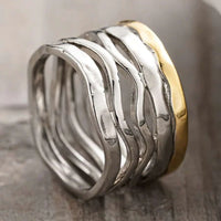 Zilveren brede golvende ring met goudkleurige rand