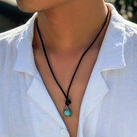 Bohemian ketting met zilveren ring en turkooizen steen