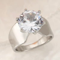 Zilveren ring met bloemen en blad in laagjes