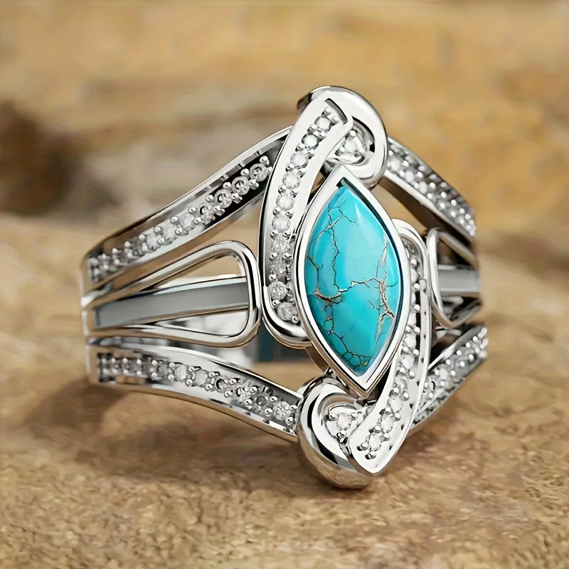 Zilveren brede ring met marquise turquoise en zirkonia