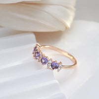 Roségouden ring met paarse en witte zirkonia