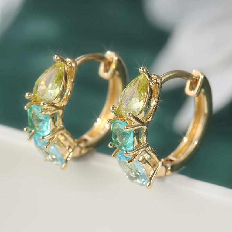 Gouden oorbellen met gele en blauwgroene edelstenen
