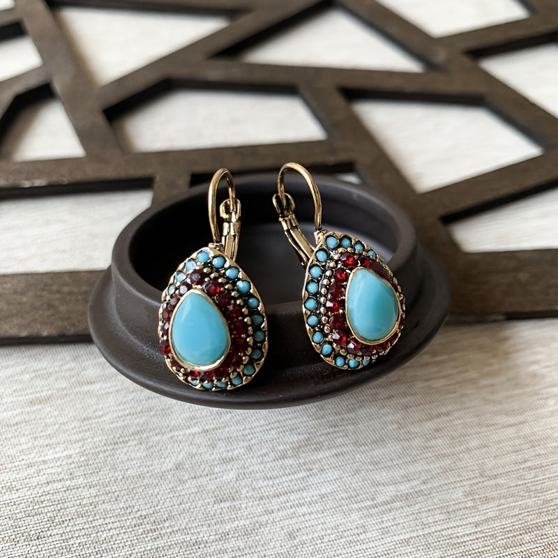 Bohemian bronzen oorbellen met turkoois en rode strass