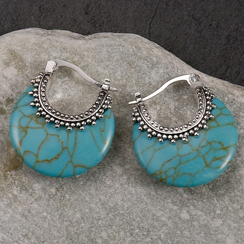 Zilveren bohemian oorbellen met turquoise schijf