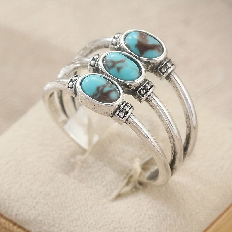 Zilveren bohemian ring met drie turquoise stenen
