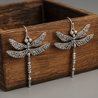 Zilveren bohemian oorbellen met libelle
