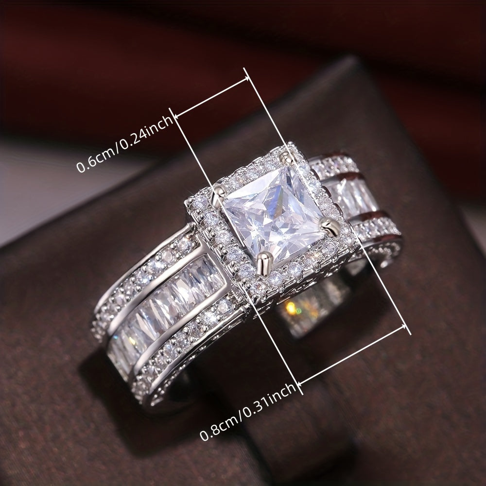 Zilveren halo ring met prinses geslepen zirkonia