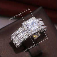 Zilveren halo ring met prinses geslepen zirkonia