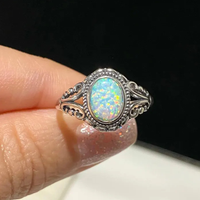 Zilveren vintage ring met ovale opaal