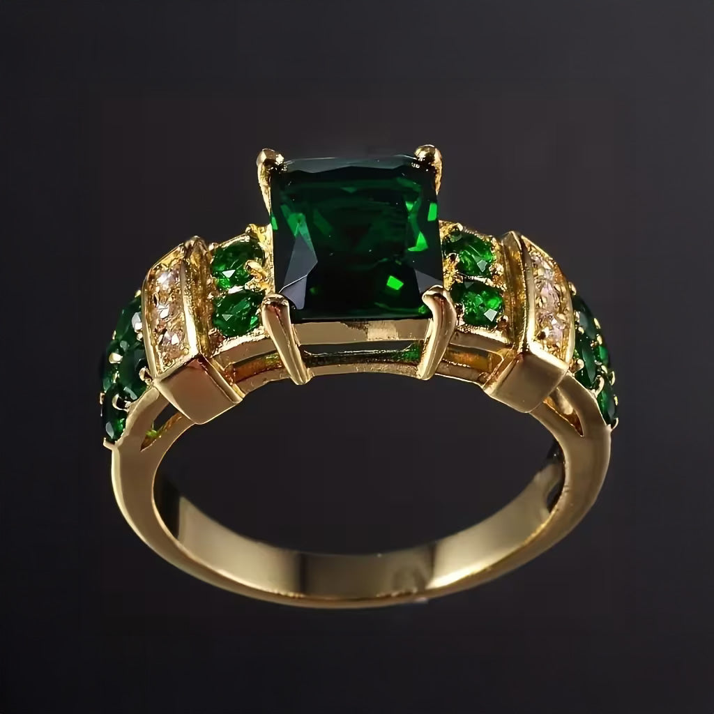 Gouden ring met vierkante groene edelsteen