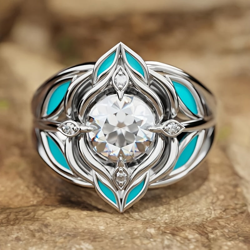 Zilveren ring met zirkonia en turquoise emaille blaadjes
