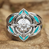 Zilveren ring met zirkonia en turquoise emaille blaadjes
