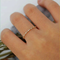 Gouden minimalistische ring met kleine zirkonia