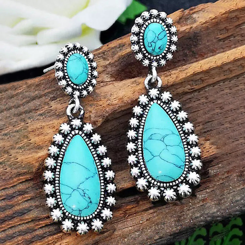 Zilveren oorbellen met turquoise druppels