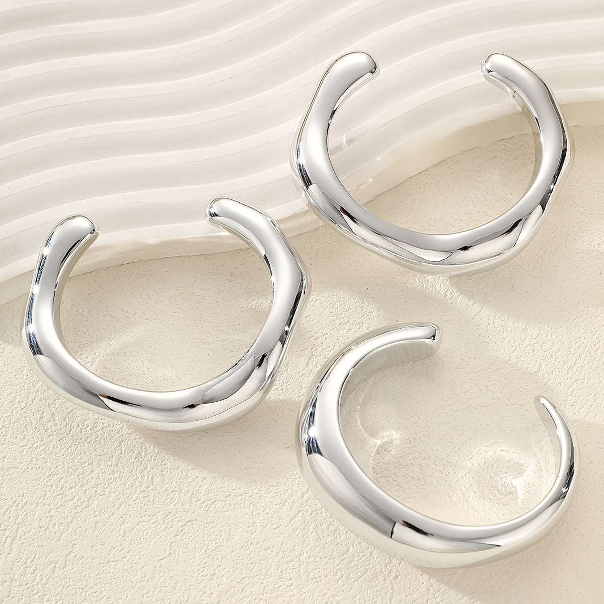 Zilveren chunky golvende bangle-armbandenset