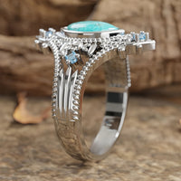 Zilveren vintage ring met marquise turkoois en blauwe steentjes