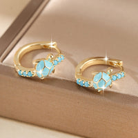 Gouden oorbellen met turquoise schildpadje