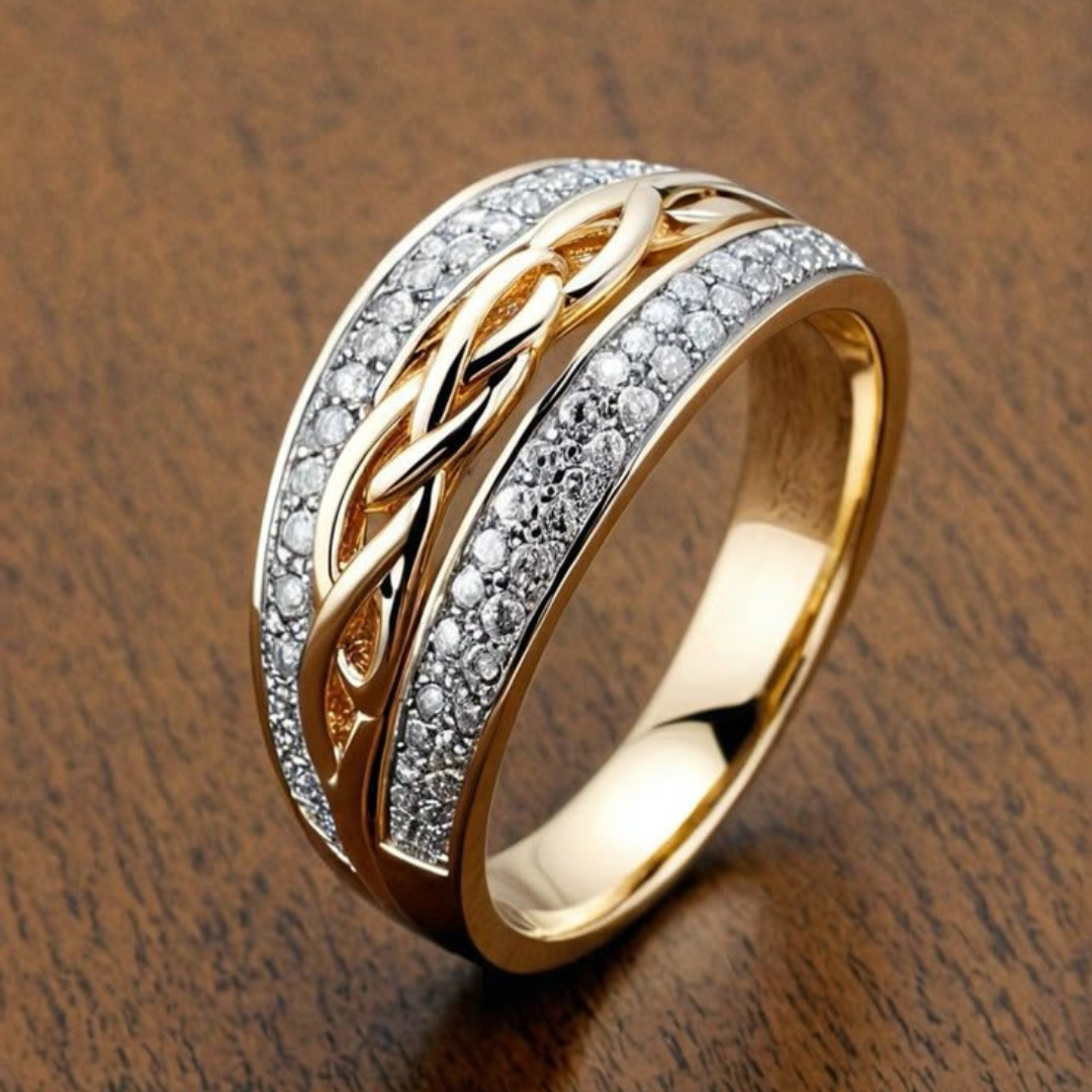 Tweekleurige ring in goud en zilver met zirkonia en vlechtmotief