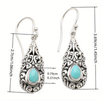 Zilveren vintage druppeloorbellen met turquoise