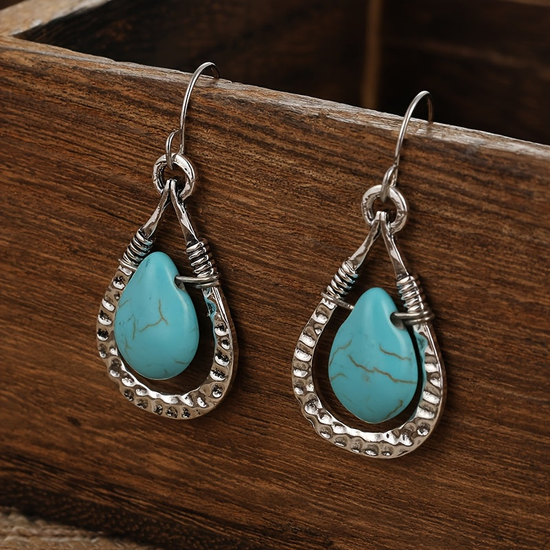 Zilveren oorbellen met wire-wrapped turquoise druppel