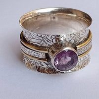 Zilveren spinner ring met amethist