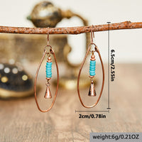 Koperen bohemian hoepel oorbellen met turquoise kralen