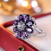 Zilveren ring met paarse en witte zirkonia bloem
