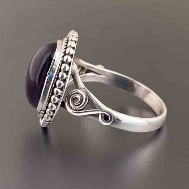 Zilveren vintage ring met ovale roze edelsteen