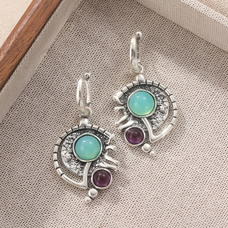 Zilveren bohemian oorbellen met groene edelsteen