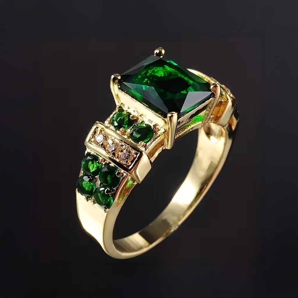 Gouden ring met vierkante groene edelsteen