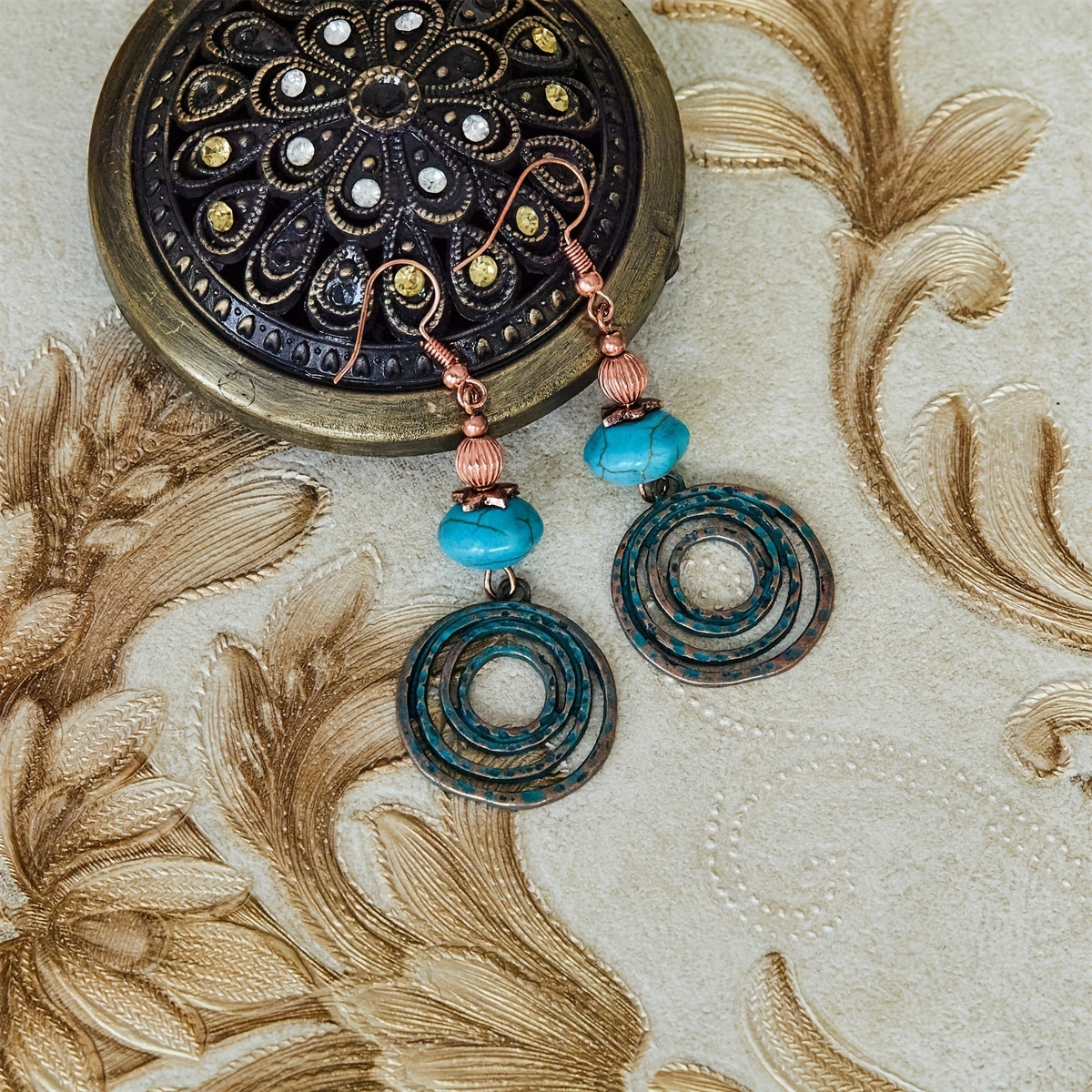 Bohemian oorbellen met roségoud spiraal en turquoise