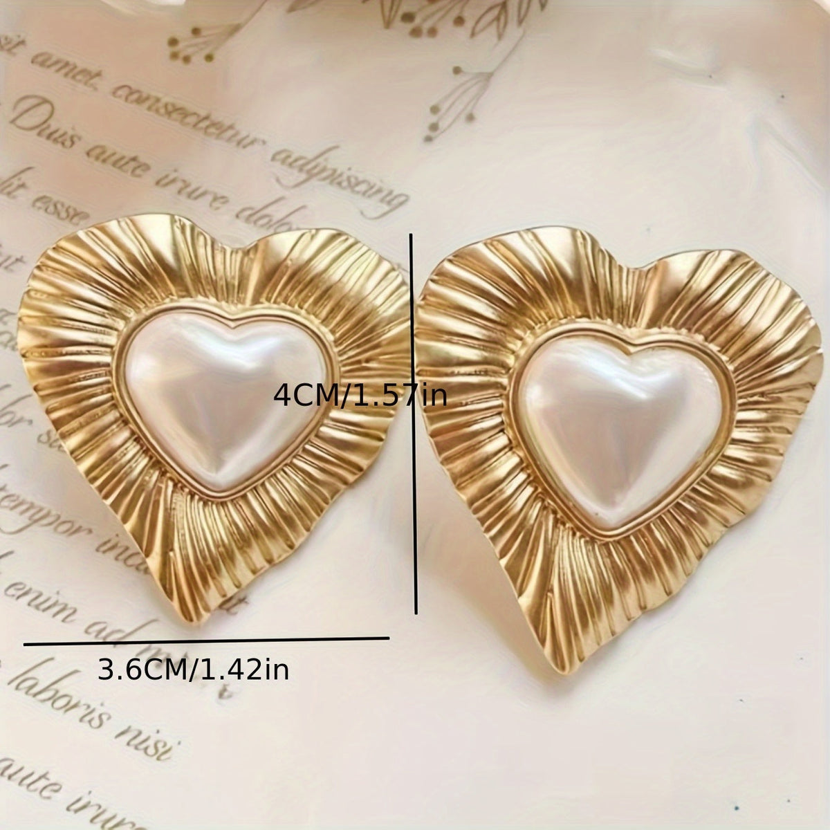 Gouden vintage hartoorbellen met parel