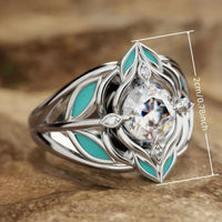 Zilveren ring met zirkonia en turquoise emaille blaadjes