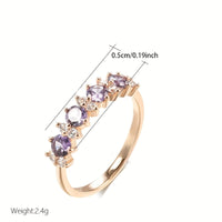 Roségouden ring met paarse en witte zirkonia