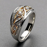 Tweekleurige ring in zilver en goud met zirkonia
