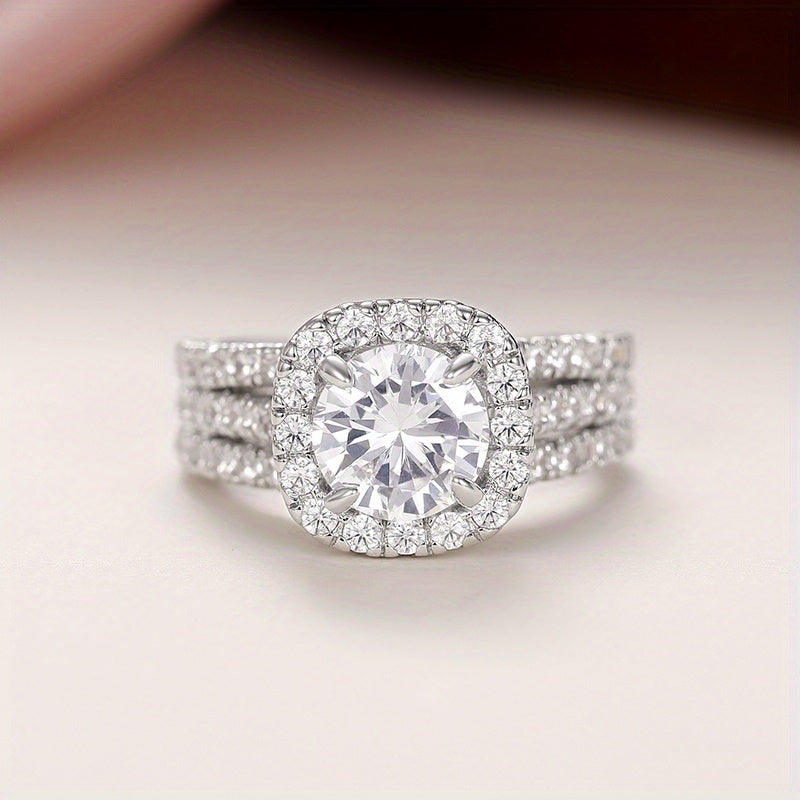 Zilveren halo-ring met ronde zirkonia