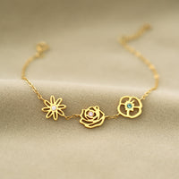 Gouden armband met geboortebloemen