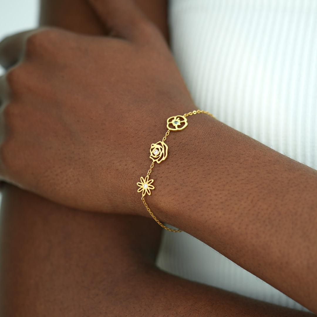 Gouden armband met geboortebloemen