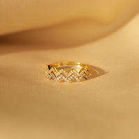 Gouden golvende zigzag ring met zirkonia