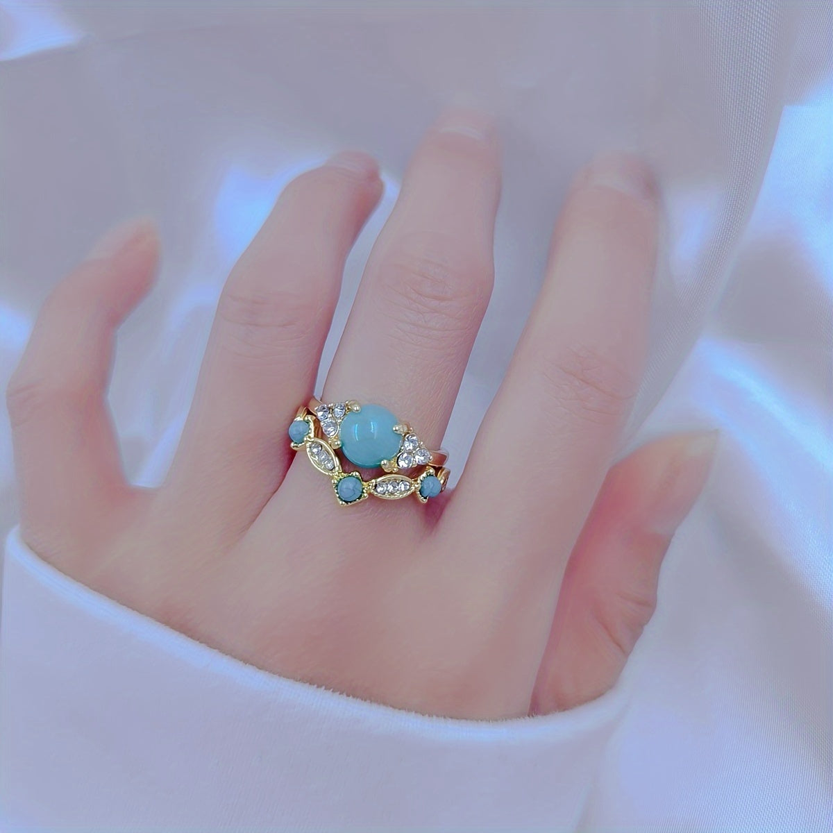 Gouden vintage ring met turquoise bloemmotief