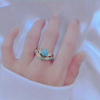 Gouden vintage ring met turquoise bloemmotief
