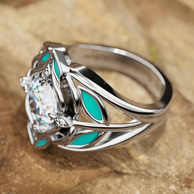 Zilveren ring met zirkonia en turquoise emaille blaadjes