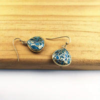 Gouden bohemian druppeloorbellen met turquoise mozaïek