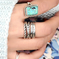 Zilveren brede draairing met turquoise accent