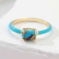 Gouden vintage oorbellen met turquoise stenen