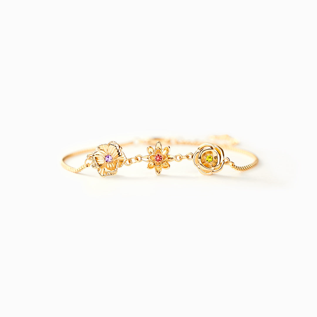 Gouden armband met 3D geboortebloemen en kleurrijke stenen